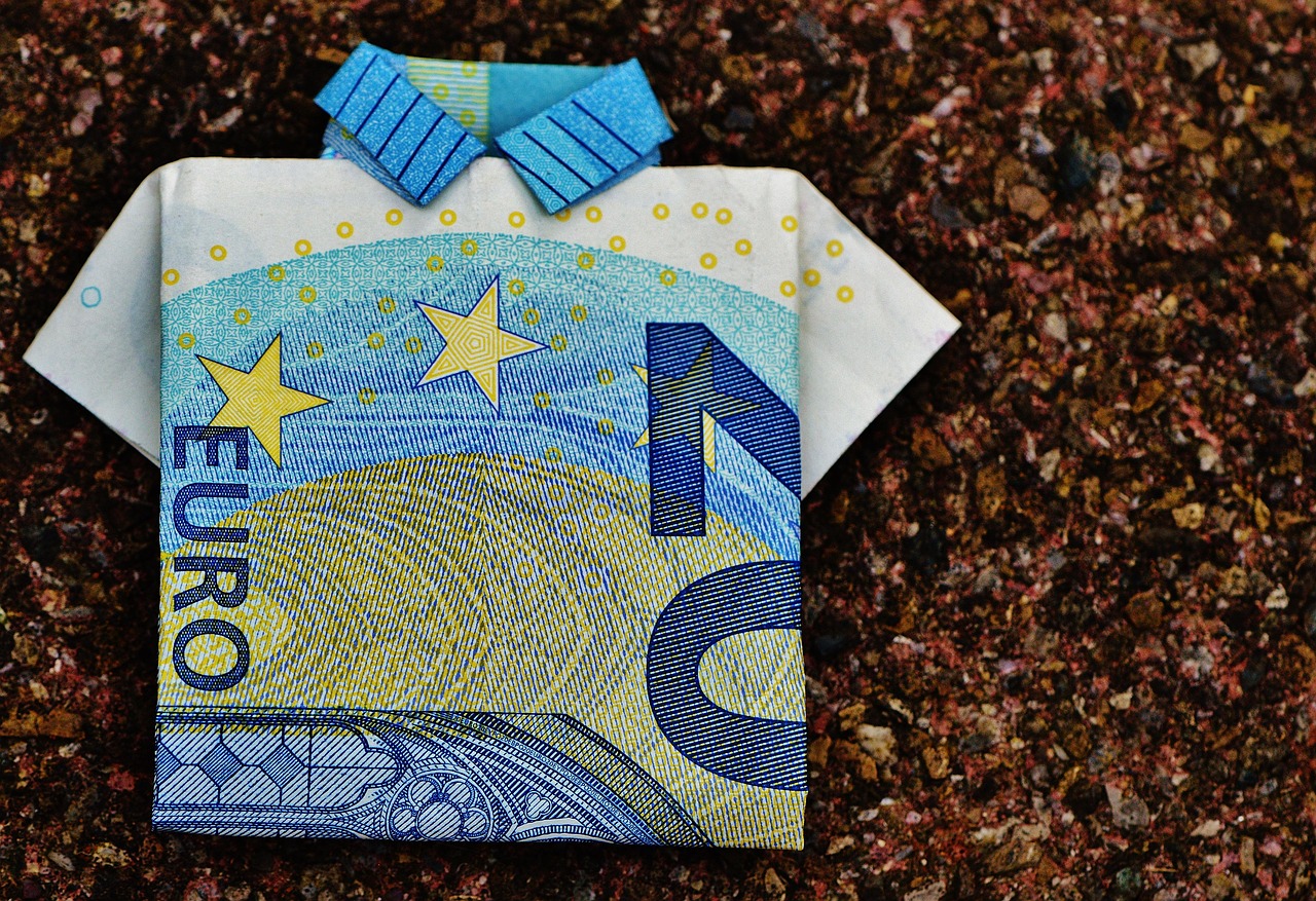 folded euro and dollar bills
